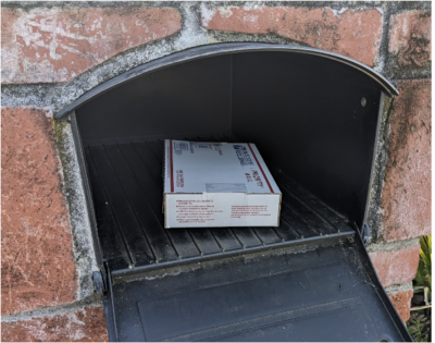Postage has been prepaid.  (note: instead of a box, you may be provided with a padded envelope)